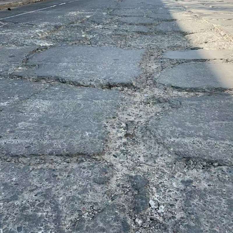 万柏林路面起砂露石子修补料